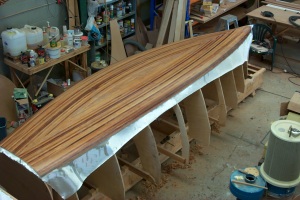 The bottom of my Eve 16 Hull was stripped and then glue lapstrake ply on the sides.